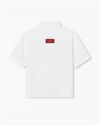 white dobbel shirt with polo and creating stories to tell my grandchildren label