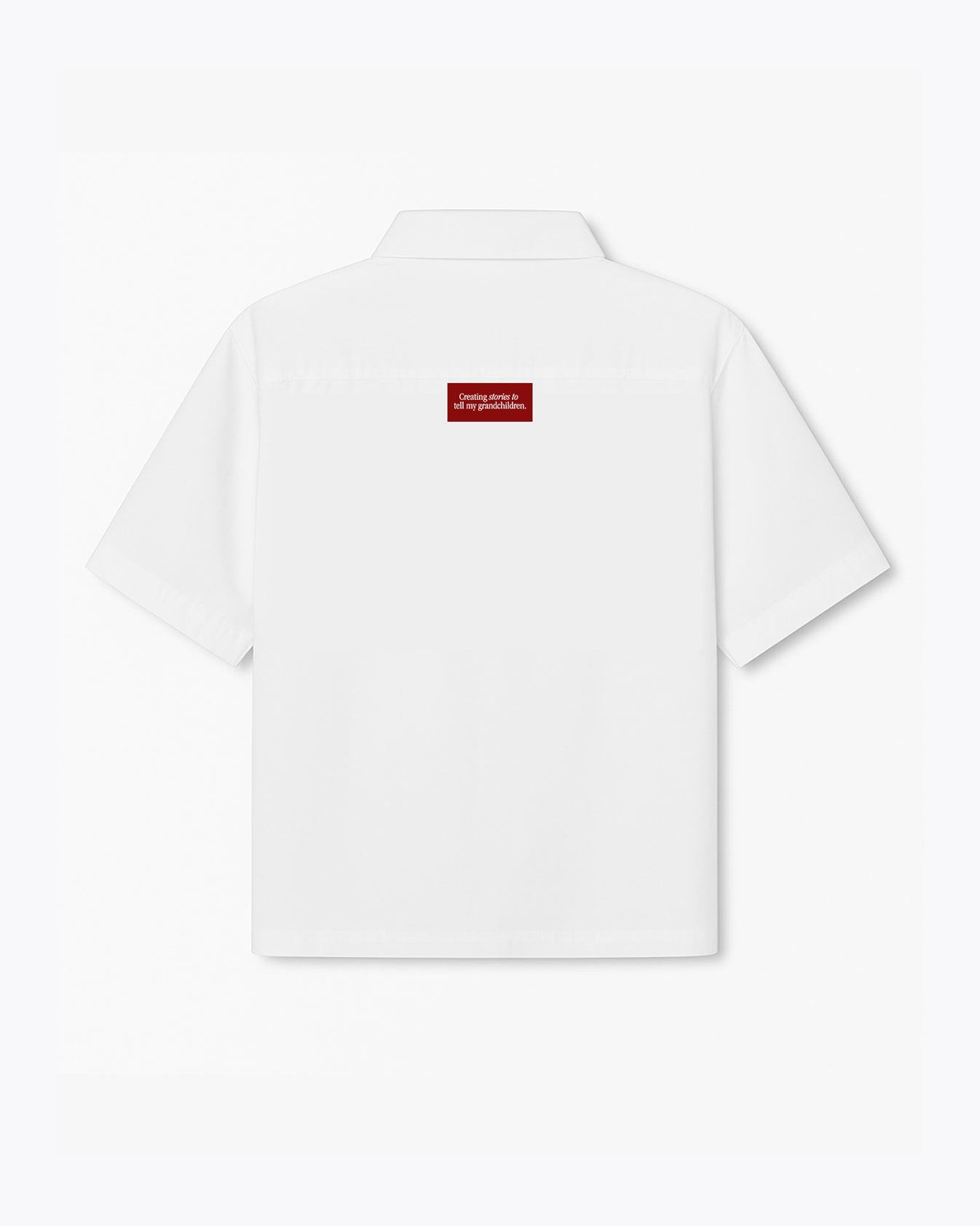white dobbel shirt with polo and creating stories to tell my grandchildren label