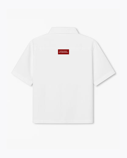 white dobbel shirt with polo and creating stories to tell my grandchildren label
